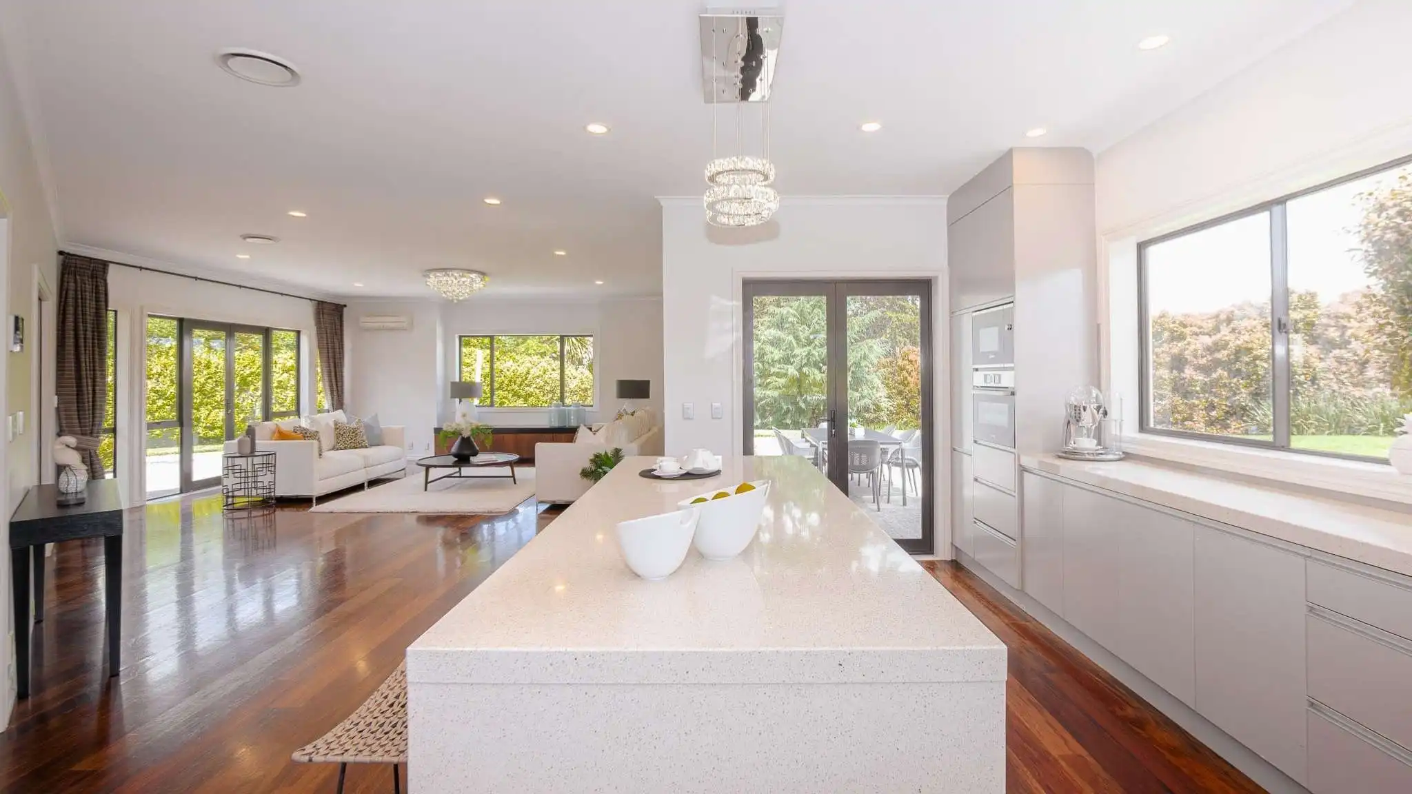 Open-plan kitchen and dining area in modern residential interior.