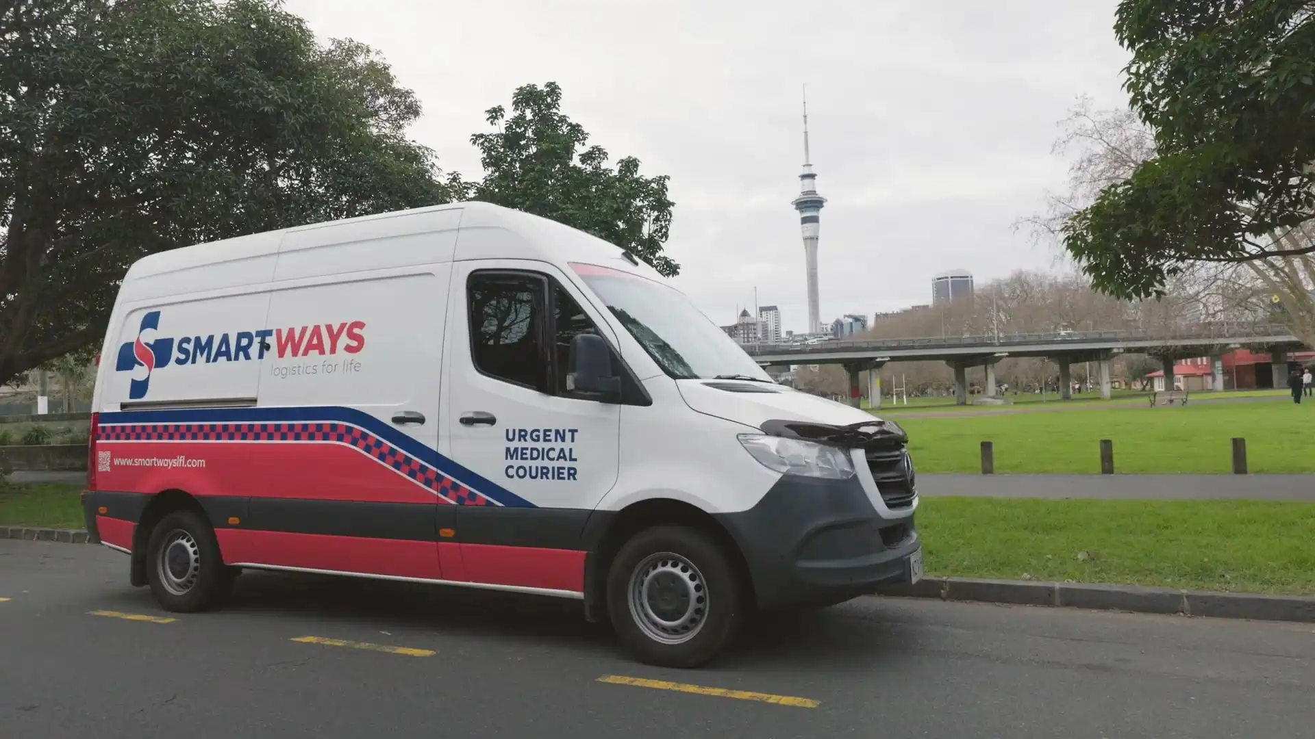 Smartways logistics van filmed by Auckland commercial videographer with Auckland skyline in background.